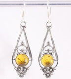 Lange opengewerkte zilveren oorbellen met amber afbeelding 1