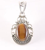 Opengewerkte zilveren hanger met tijgeroog afbeelding 1