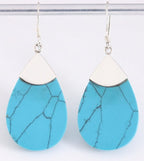 Grote druppelvormige zilveren oorbellen met blauwe turkoois afbeelding 1