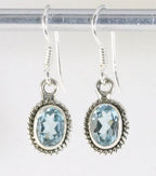 Fijne bewerkte zilveren oorbellen met blauwe topaas afbeelding 1