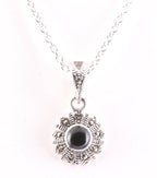 Fijne zilveren hanger met onyx en marcasiet aan ketting afbeelding 1