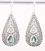 Opengewerkte zilveren oorbellen met groene topaas afbeelding 1