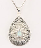 Traditionele bewerkte zilveren hanger met welo opaal aan ketting afbeelding 1