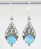 Opengewerkte zilveren oorbellen met blauwe opaal afbeelding 1