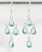 Fijne zilveren oorbellen met blauwe topaas afbeelding 1