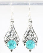 Opengewerkte zilveren oorbellen met turkoois afbeelding 1