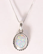 Fijne bewerkte zilveren hanger met welo opaal aan ketting afbeelding 1