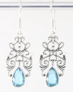 Opengewerkte zilveren oorbellen met blauwe topaas afbeelding 1