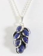 Trosvormige zilveren hanger met lapis lazuli aan jasseron ketting afbeelding 1