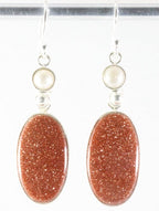 Lange zilveren oorbellen met goudsteen en parel afbeelding 1