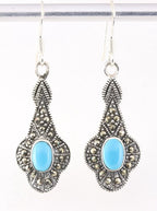 Zilveren oorbellen met blauwe turkoois en marcasiet afbeelding 1