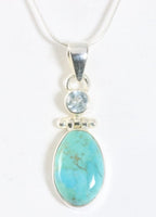 Zilveren hanger met groene Mohave turkoois en blauwe topaas aan ketting afbeelding 1