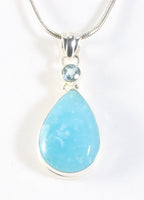 Zilveren hanger met smithsoniet en blauwe topaas aan ketting afbeelding 1