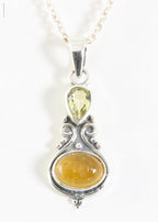 Fijne bewerkte zilveren hanger met amber en citrien aan ketting afbeelding 1