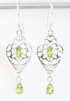 Opengewerkte hoogglans zilveren oorbellen met peridoot afbeelding 1