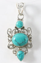 Opengewerkte zilveren hanger met turkoois afbeelding 1