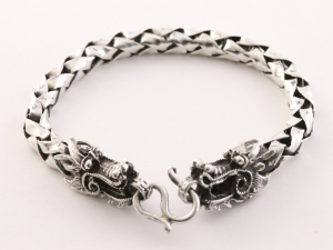 31219 Zware zilveren armband met drakenkoppen en schubbenschakels