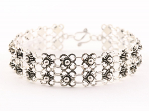 32062 Fijn bewerkte zilveren schakelarmband - lengte 18 cm.