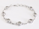 31494 Bewerkte zilveren schakelarmband met bergkristal