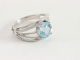 21468 Opengewerkte zilveren ring met blauwe topaas  