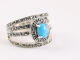 23556 Zware opengewerkte zilveren ring met blauwe turkoois en marcasiet