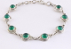 30793 Bewerkte zilveren armband met groene onyx