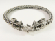 30571 Zware gevlochten zilveren armband met drakenkoppen
