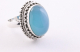 22196 Zware bewerkte zilveren ring met blauwe chalcedoon