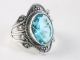 25042 Bewerkte zilveren ring met blauwe topaas