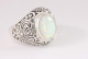 21719 Opengewerkte zilveren ring met welo opaal