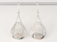 51297 Opengewerkte zilveren oorbellen met welo opaal  
