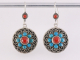 51952 Traditionele zilveren oorbellen met blauwe turkoois en bloedkoraal