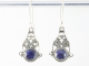 54659 Opengewerkte zilveren oorbellen met blauwe saffier