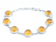 32390 Bewerkte zilveren armband met amber