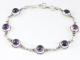 32470 Bewerkte zilveren armband met amethist