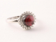 21306 Zilveren ring met granaat en witte topaas