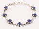 31716 Bewerkte zilveren schakelarmband met gefacetteerde lapis lazuli