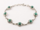 31575 Bewerkte zilveren schakelarmband met malachiet