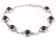 31855 Bewerkte zilveren armband met onyx