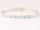32251 Zilveren tennisarmband met blauwe topaas