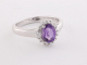 22366 Zilveren ring met amethist en witte topaas