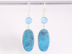53866 Lange zilveren oorbellen met chrysocolla en blauwe chalcedoon