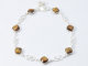 61261 Zilveren enkelband met tijgeroog
