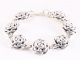31511 Hoogglans zilveren schakelarmband met roosjes - lengte 20 cm