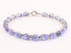 31728 Zilveren tennisarmband met tanzaniet cabochon