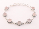 31473 Bewerkte zilveren schakelarmband met rozenkwarts